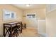 Bright kitchen eat-in with tiled floors and a table with seating for three at 4779 S Bannock St, Englewood, CO 80110