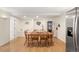 Inviting dining room features hardwood floors, recessed lighting, and seating for six at 13131 Pennsylvania St, Thornton, CO 80241