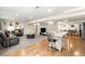 Open living area with hardwood floors, neutral tones, and a comfortable seating area at 13131 Pennsylvania St, Thornton, CO 80241