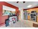 Open kitchen layout featuring stainless steel appliances and a breakfast bar at 10972 Fairfax Ct, Thornton, CO 80233