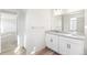 Clean bathroom with double vanity and neutral tones at 13372 E 110Th Way, Commerce City, CO 80022