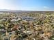 Wide aerial shot featuring a mixed-density neighborhood with single-Gathering homes and multi-unit complexes at 3778 S Hooker St, Englewood, CO 80110