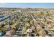 Panoramic aerial view of a neighborhood featuring tree-lined streets and a variety of home styles at 3778 S Hooker St, Englewood, CO 80110