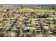 Scenic aerial view of the neighborhood near a baseball field and school, offering community amenities at 3778 S Hooker St, Englewood, CO 80110