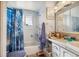 Bathroom with tub and shower at 3778 S Hooker St, Englewood, CO 80110