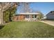 Inviting single-Gathering home with a well-maintained lawn and covered porch at 3778 S Hooker St, Englewood, CO 80110