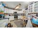 Bright kitchen with modern stainless steel appliances and white cabinetry at 3778 S Hooker St, Englewood, CO 80110