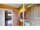 Compact bathroom features a glass shower and updated vanity at 4487 S Alkire St, Morrison, CO 80465