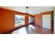 Entryway with wood floors, colorful walls, light fixture and a large window for lots of light at 4487 S Alkire St, Morrison, CO 80465