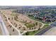 Aerial view of community with park and walking paths at 4937 Tamarac St, Denver, CO 80238