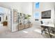 Home office with built-in shelving and a workspace at 4937 Tamarac St, Denver, CO 80238