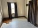 Bedroom with light-colored floors, gray trim, and window at 2915 W 4Th Ave, Denver, CO 80219