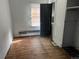 Bedroom with hardwood floor, window, and closet at 2915 W 4Th Ave, Denver, CO 80219