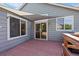 Back deck area with shade cover, access to the house, and wood railings at 8761 Cloverleaf Cir, Parker, CO 80134