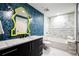 Contemporary bathroom featuring marble countertops and a tub-shower combo at 2001 Lincoln St # 2923, Denver, CO 80202