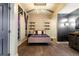 Stylish bedroom with a modern brick wall and contemporary decor at 2001 Lincoln St # 2923, Denver, CO 80202