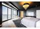 This stylish bedroom is spacious and offers a great view of the city skyline at 2001 Lincoln St # 2923, Denver, CO 80202