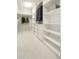 Bright walk-in closet with ample storage space, featuring custom shelving and hanging rods at 2001 Lincoln St # 2923, Denver, CO 80202