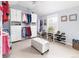 Spacious walk-in closet with custom shelving and storage at 6964 S Olive Way, Centennial, CO 80112