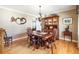 Dining room with hardwood floors, chandelier, and wooden furniture at 6964 S Olive Way, Centennial, CO 80112
