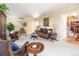 Inviting living room featuring comfortable seating, hardwood floors, and a neutral color palette at 6964 S Olive Way, Centennial, CO 80112
