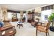 Formal living room with comfortable seating, elegant decor, and natural light at 6964 S Olive Way, Centennial, CO 80112