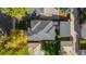 Aerial view of house showcasing roofline and backyard at 1170 S Monroe St, Denver, CO 80210