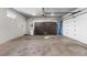 Spacious garage with ample storage cabinets and epoxy flooring at 1170 S Monroe St, Denver, CO 80210