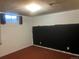 Spacious unfinished basement with painted walls and a partially exposed ceiling at 598 Toledo St, Aurora, CO 80011