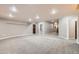 Large finished basement offering flexible living space and potential for customization at 1007 Thorncreek Ct, Thornton, CO 80241