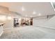 Finished basement featuring recessed lighting and space for entertaining at 1007 Thorncreek Ct, Thornton, CO 80241