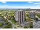 A serene high-rise residential building surrounded by lush greenery, offering picturesque views of the city at 3131 E Alameda Ave # 803, Denver, CO 80209