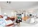 Open floorplan featuring a stylish living room, kitchen, and dining area perfect for entertaining at 3131 E Alameda Ave # 803, Denver, CO 80209