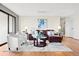 Comfortable living room featuring stylish furniture and ample natural light at 3131 E Alameda Ave # 803, Denver, CO 80209