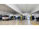 Well-lit parking garage with multiple assigned parking spots at 3131 E Alameda Ave # 803, Denver, CO 80209
