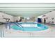 Indoor pool area with clear water and ample seating for relaxation at 3131 E Alameda Ave # 803, Denver, CO 80209