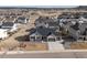 Aerial view of a home in a neighborhood, highlighting the home's layout and surrounding landscape at 6766 Mentha Dr, Castle Rock, CO 80108