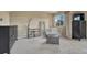 Relaxing bedroom offers neutral colors, natural light, and dark furnishings creating a peaceful retreat at 15235 W Iliff Ave, Lakewood, CO 80228
