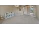 This bedroom has a neutral wall color and a doorway at 15235 W Iliff Ave, Lakewood, CO 80228