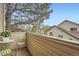 Cozy balcony with a table, chair and view of neighborhood homes at 1661 S Fulton St, Aurora, CO 80247