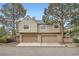 Exterior view of building with a two car garage at 1661 S Fulton St, Aurora, CO 80247