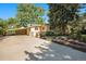 Charming single-story home with mature trees and a long driveway, perfect for suburban living at 895 Vance St, Lakewood, CO 80214