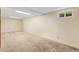 Spacious finished basement with plush carpeting and recessed lighting, perfect for entertaining at 430 S Potomac Cir, Aurora, CO 80012