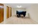 Finished basement featuring plush carpet, closet storage, and a drum set at 430 S Potomac Cir, Aurora, CO 80012