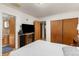 Bedroom featuring a large closet and an en-suite bathroom at 430 S Potomac Cir, Aurora, CO 80012