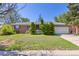Charming single-story home with a well-manicured lawn and attached two car garage at 430 S Potomac Cir, Aurora, CO 80012