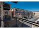 A view from the balcony showing the building's exterior and the parking area at 13456 Via Varra # 208, Broomfield, CO 80020