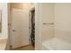Bathroom featuring a stacked washer and dryer unit for added convenience at 13456 Via Varra # 208, Broomfield, CO 80020