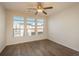 Bedroom with ample light and large windows offering outdoor views at 13456 Via Varra # 208, Broomfield, CO 80020