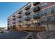 Exterior of building with multiple levels and decks at 13456 Via Varra # 208, Broomfield, CO 80020